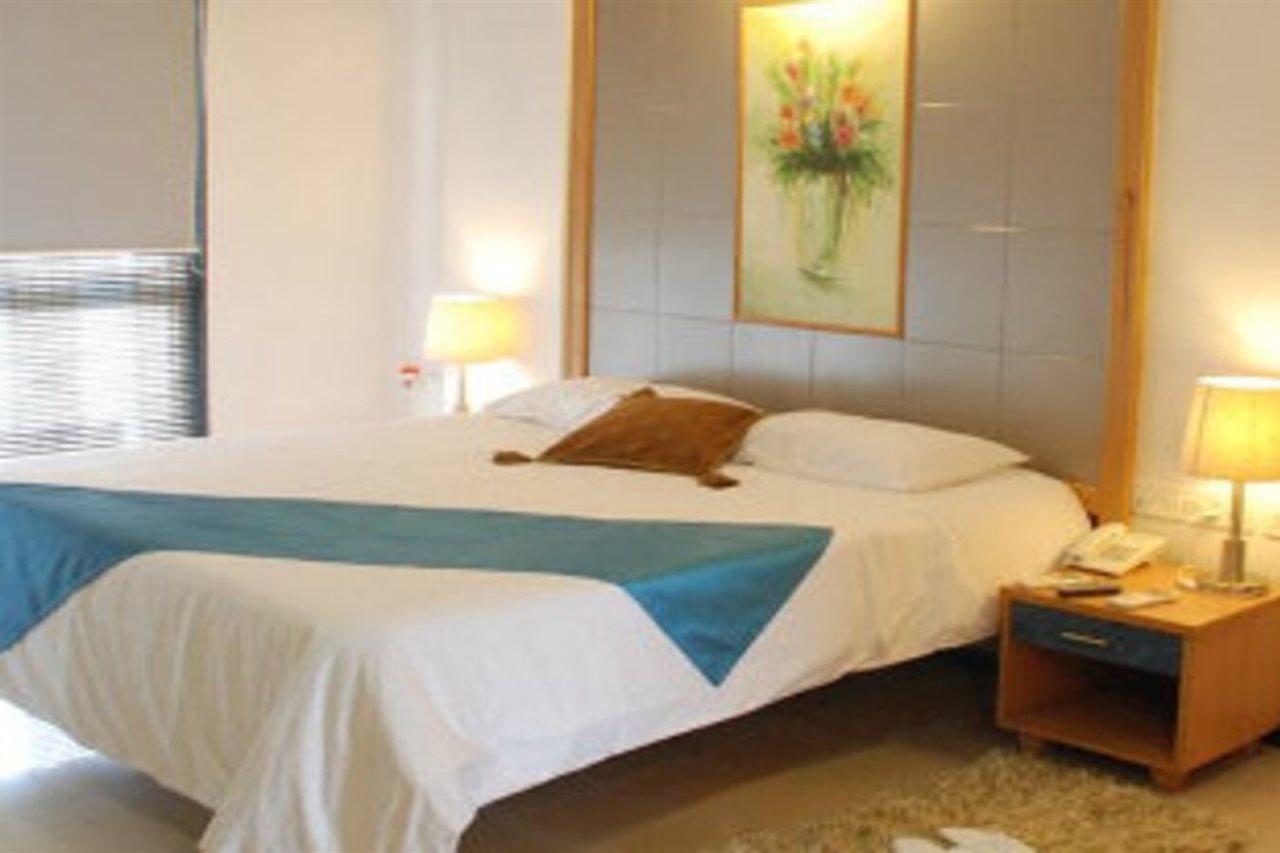ทรีโบ เทรนด์ เอธา สวีท Hotel บังกาลอร์ ภายนอก รูปภาพ